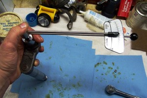 torquing roller assembly A new roller assembly was installed in the arm, and torqued to specs using a small inch-pound torque wrench
